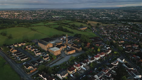 Establishing-Drone-Shot-Over-Calverley-Village-and-Old-Mill-on-Overcast-Day