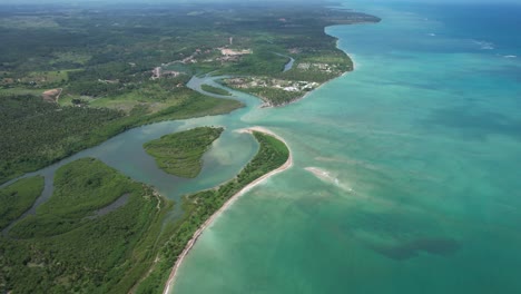 flying over the beach of são miguel dos milagres beach in the state of alagoas, brazil.