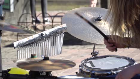 street musician plays the drums. the concept of lifestyle.