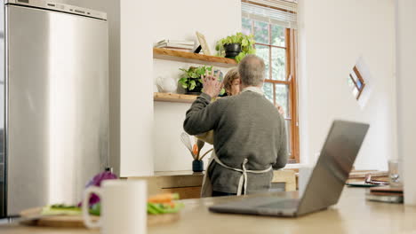 love, dance and senior couple in the kitchen