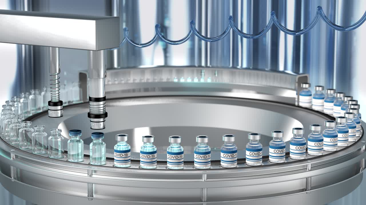 SARS-COV-2 COVID-19 Mass production of coronavirus vaccine, a machine pours the vaccine, seals bottle caps into ampoules moving along a pharmaceutical conveyor belt in a research laboratory