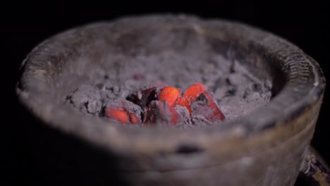 coal-burning-inside-incense-burner-tradition-house-perfume-in-Yemen-Arab-region