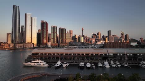 stunning sunset over sydney harbour with city skyline