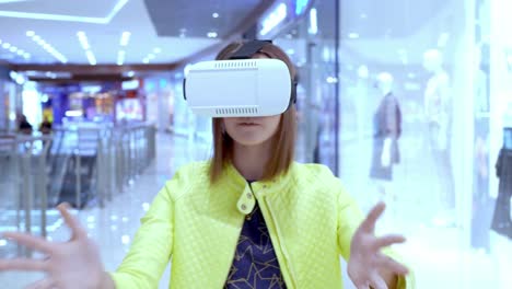 woman experiencing virtual reality in a shopping mall