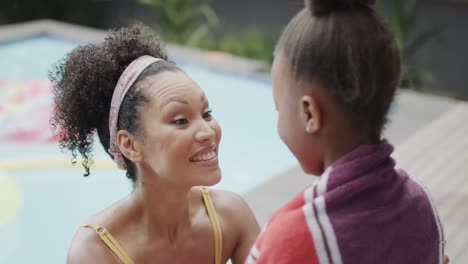happy african american mother and daughter spending time together at home, slow motion