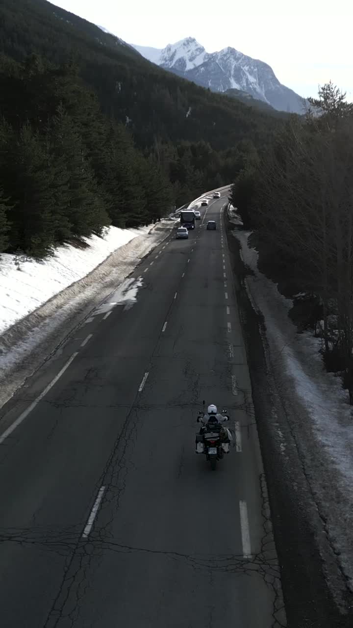 Motorcycle on a mountain road in winter