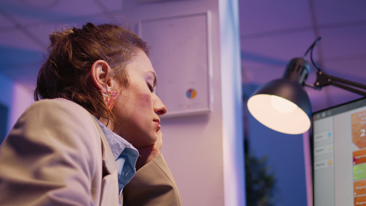 Overworked businesswoman in office