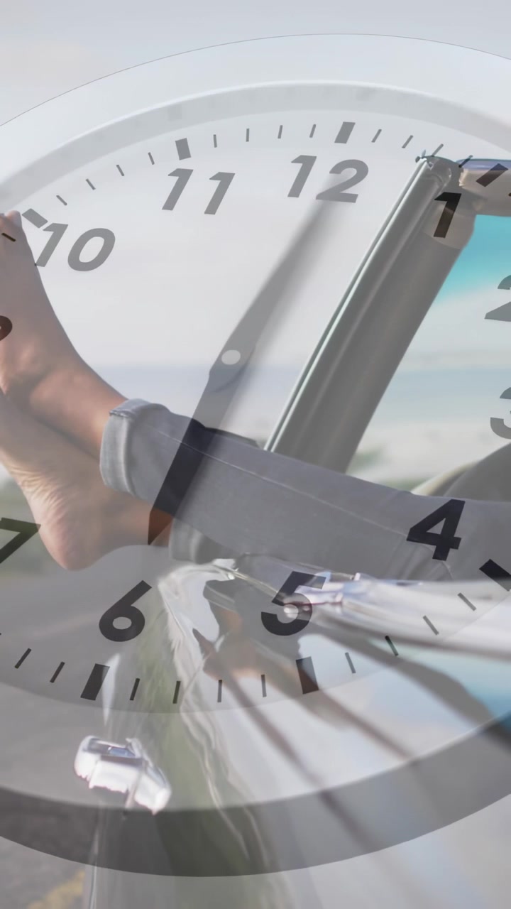 Vertical video: Woman reclining feet on dash car moving, clock overlay on legs marking travel time