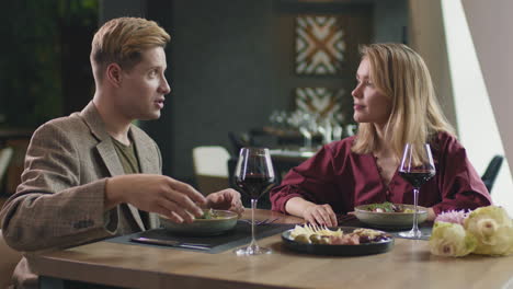 couple enjoying dinner at a restaurant