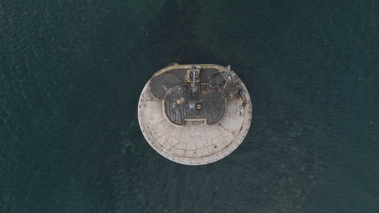 Aerial view St Helens Fort, sea fort in the Solent close to the Isle of Wight, was built as result of the Royal Commission on the Defence of the United Kingdom of 1859, drone descending over the fort