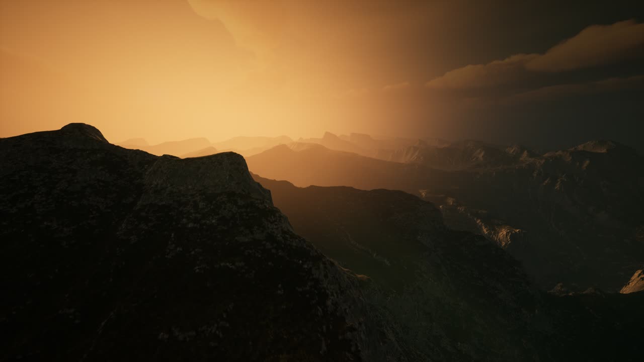 High mountain peaks covered with dramatic heavy fog