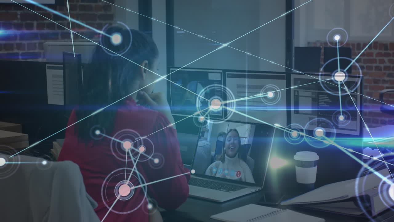 Animation of network of connections over biracial businesswoman in office