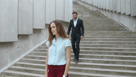 woman checking time on smartwatch