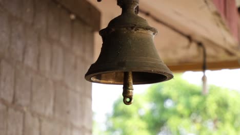 Swinging-Temple-Bell-Location--Narahari-Parvatha-Temple,-DK-KA-India