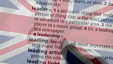 animation of circling word in text over uk flag