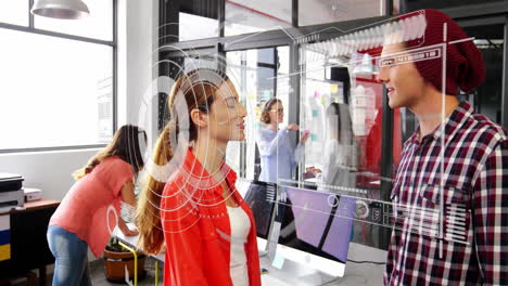 coworkers collaborating in tech office with sticky notes and floating digital interface overlays