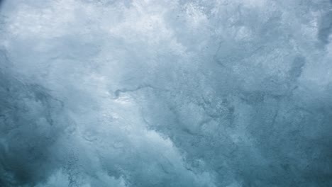 underwater view of a powerful wave