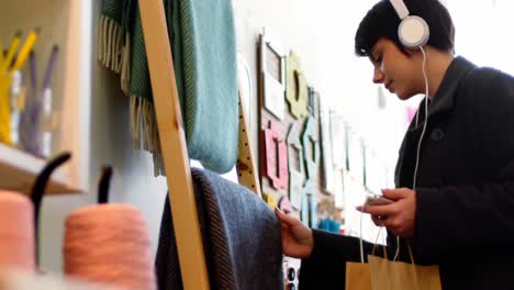 young woman selecting a blanket