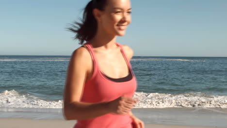 attractive woman running on the beach