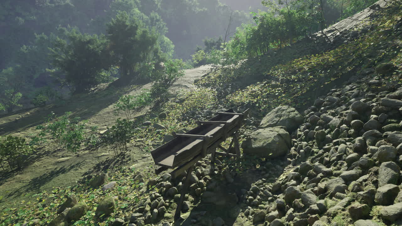 Abandoned cart on a rocky path in a tranquil forest setting