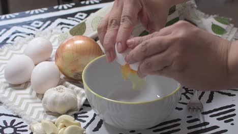 preparing eggs with onion and garlic