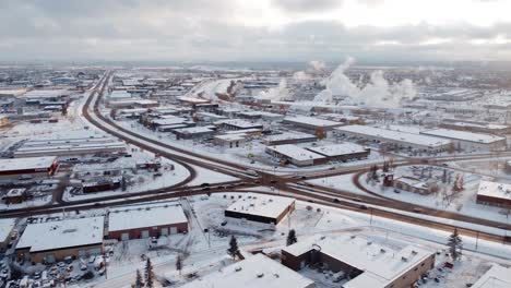 canadian winter from aerial perspective with steaming warehouses and snow everywhere