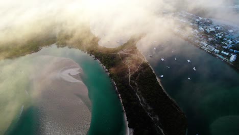 misty clouds over noosa heads coastal town in the shire of noosa, queensland, australia