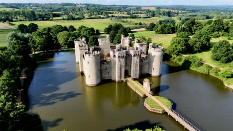 soar over and towards bodiam castle with immersive 4k drone footage. perfect for storytelling, travel features, and educational media.