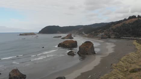 dramatic oregon coastline waves and island outcropping