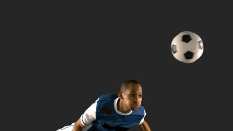 football player heading the ball