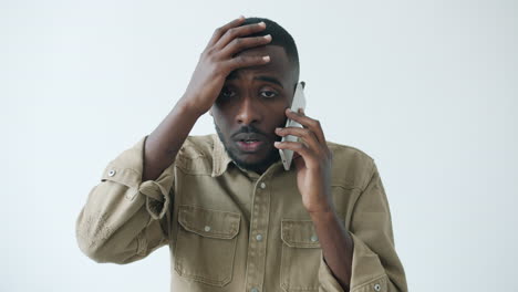 stressed man on phone