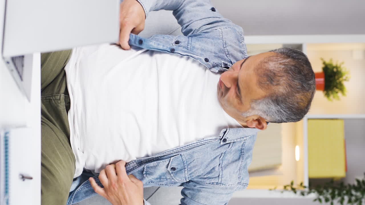 Vertical video of The man who is dissatisfied with his weight.