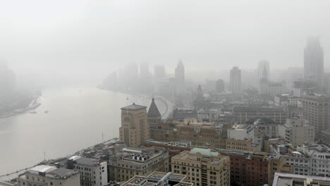 aerial video of shanghai city during a very foggy day