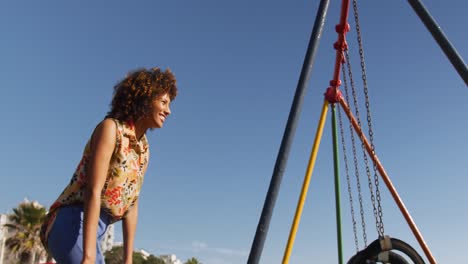 Mother-and-son-having-fun-at-playground