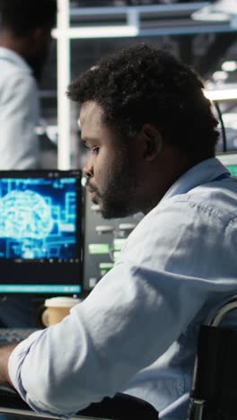 Vertical Video Server Room Admin With Disability Interprets Machine Learning Generated Data