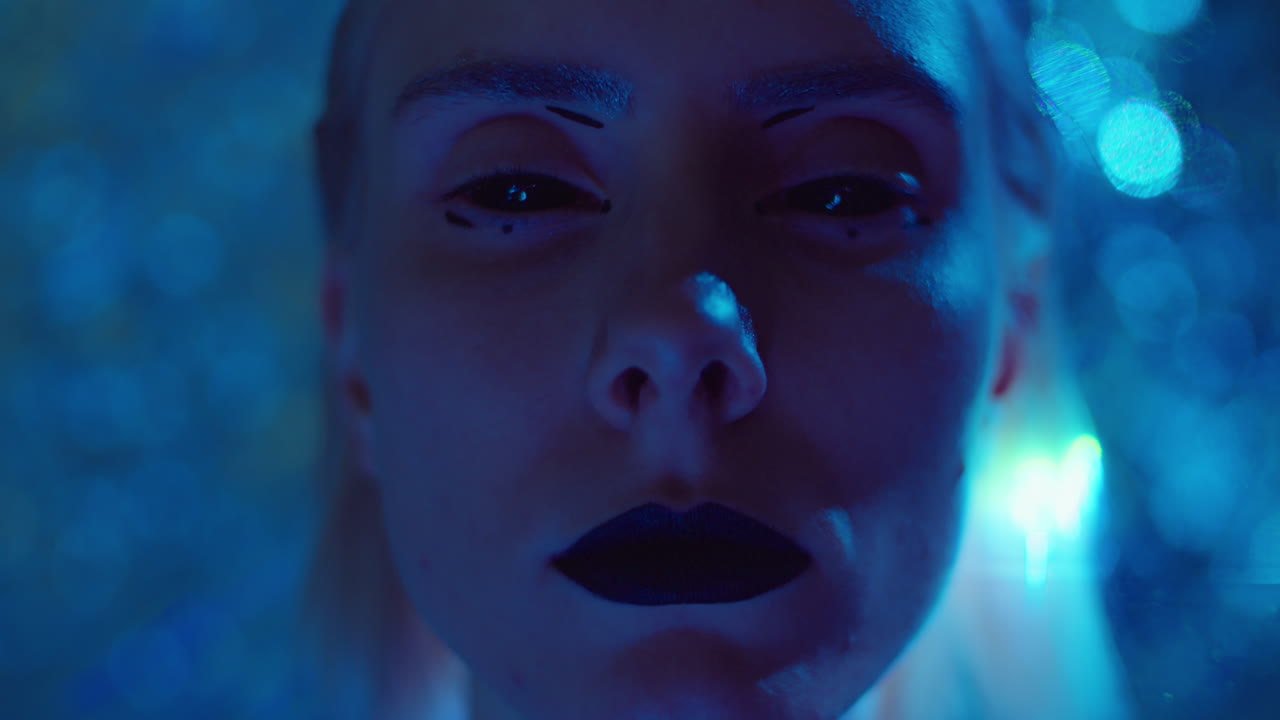 Creative Portrait of Gothic Woman in Laser Light