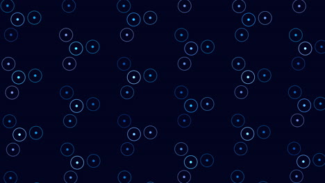 circular pattern of blue and black circles floating on dark background