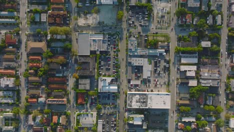 vertically panning birds eye shot of streets and buildings in residential urban neighbourhood. miami, usa