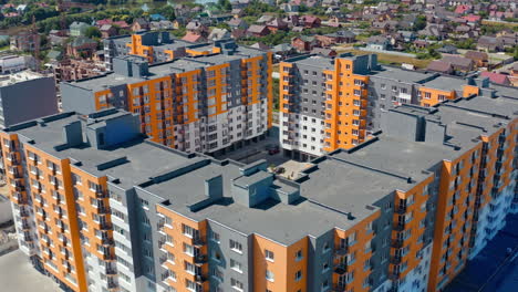 new architecture in the town. residential cityscape construction. modern complex of colorful high-rise buildings for residents of the city. aerial view.