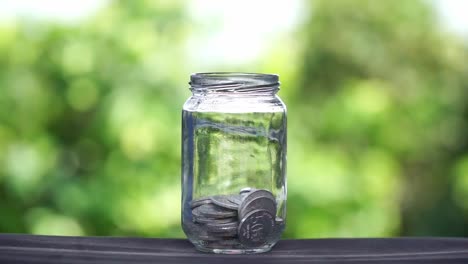 coins in a glass jar