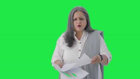 Angry-Indian-senior-female-manager-shouting-in-a-meeting-Green-screen