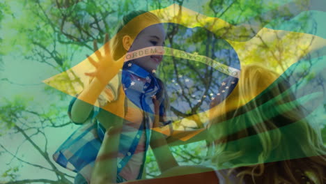 in school, children creating animation with brazil flag overlay, trees in background