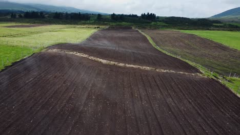 Aerial-Drone-Flying-Over-Agricultural-Land,-El-Pedregal-Neighborhood,-Cantón-Mejía,-Province-Of-Pichincha,-Ecuador