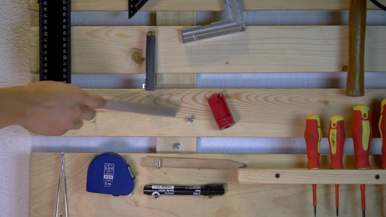 Grabbing And Putting Back in Place Caliper From a Tool Wall 4K