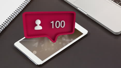 tableta y un icono de perfil para las redes sociales