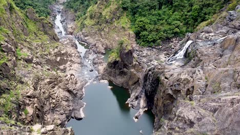 aerial - sweeping views of waterfalls, lakes and river in rainforest valley