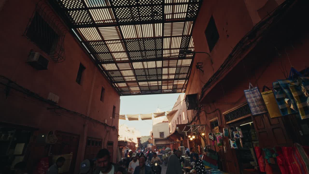 Walking through the souks markets in the Medina old town in Marrakesh, Morocco.