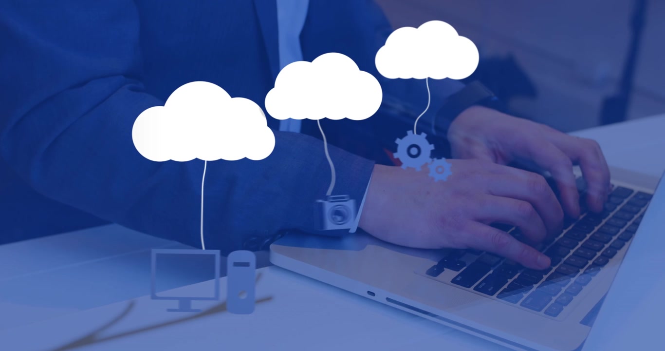 Animation of technology icons over businessman using computer