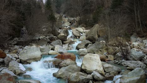 river flowing in a rock canyon in the wintertime