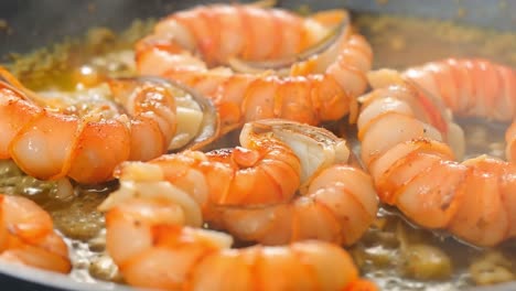 shrimp scampi cooking in pan